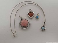 Necklace and four pendants overall view