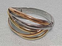 Front view showing tri-tone overlapping bar design