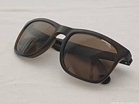 Front angled view of Carrera sunglasses showing frame and lens color