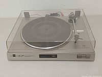 Front view of Dual CS 515 turntable with dust cover closed