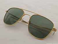 Front three-quarter view of sunglasses showing frame and lenses