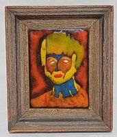 front view of framed enamel portrait