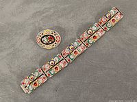 Bracelet and brooch full view