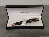 Pen and pencil set in Parker case, lid open