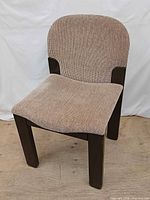 Front angled view showing upholstery pattern and wood frame