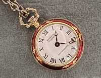 Front view of Splendid pocket watch showing dial and chain