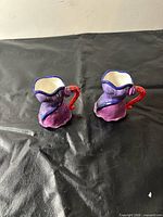 Both dress-shaped mugs front view