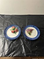 Both plates front view showing designs