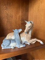 Porcelain figurine showing mare and foal