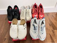 Group shot of all five pairs on boxes