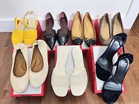 Group shot of all seven pairs on boxes