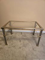 Full view of rectangular glass and chrome coffee table
