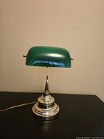 Front view showing full lamp, shade, base and cord