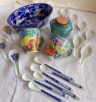 Group shot of all ceramics laid out on cloth