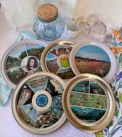 Group shot showing all trays, jar, tea towels and glass items