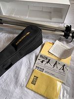 Scope accessories including tripod, carry case, cleaning cloth, manuals, foam insert