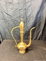 Full view of brass dallah coffee pot
