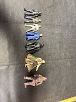 All seven figures laid out for size and completeness reference