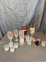 Full group of 16 assorted glasses shown