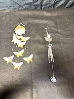 Both wind chimes side by side showing overall design and materials