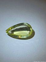 Pear-shaped lemon citrine, side view