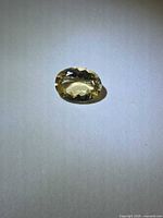 Front view of oval golden heliodor gemstone