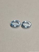Pair of oval cabochon Swiss blue topaz stones