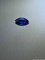 Top view of marquise sapphire showing colour and cut