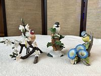 Group shot of all three porcelain bird figurines