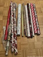 All rolls laid out on floor showing patterns and varying lengths