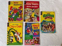 Front covers of all five Gold Key comics displayed on white background