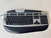 Top view of keyboard showing keys and multimedia buttons