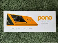 Front of box showing yellow PonoPlayer image and branding