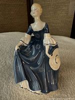 Front view of Royal Doulton Hilary figurine