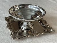 Bowl on top of tray displaying both items and reflective surfaces