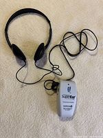 Front view of amplifier with attached headphones