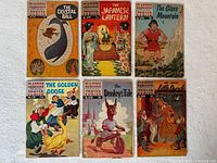 Front covers of all six comics