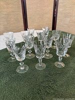 All stemmed cut crystal glasses grouped on table