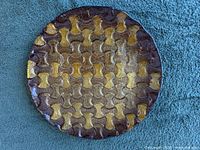 Top view showing brown and gold interlocking pattern