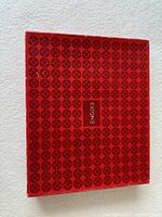 Top view of red Eaton's patterned box