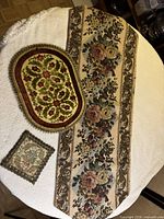 Overview of the three textiles on table