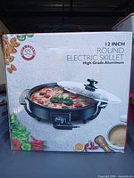 Front of retail box displaying skillet and lid
