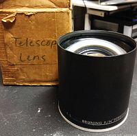 Lens front element and original box