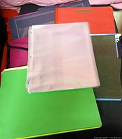 Assorted presentation books, sheet protector, colored folders