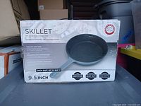 Front of box showing skillet image and specifications
