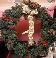 Front view of entire wreath showing decorations and bow