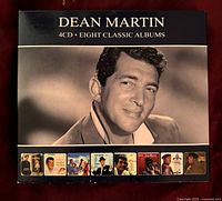 Front of slipcase with title and artist