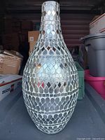 Front view of silver mirrored glass mosaic vase