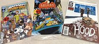 Group shot of three bagged comic books: Batman Scooby-Doo Mysteries #1, The Batman Adventures: The Little Red Book #1, The Hood #2 of 6