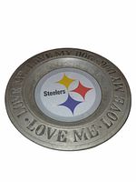 Full view of dish showing logo and rim lettering